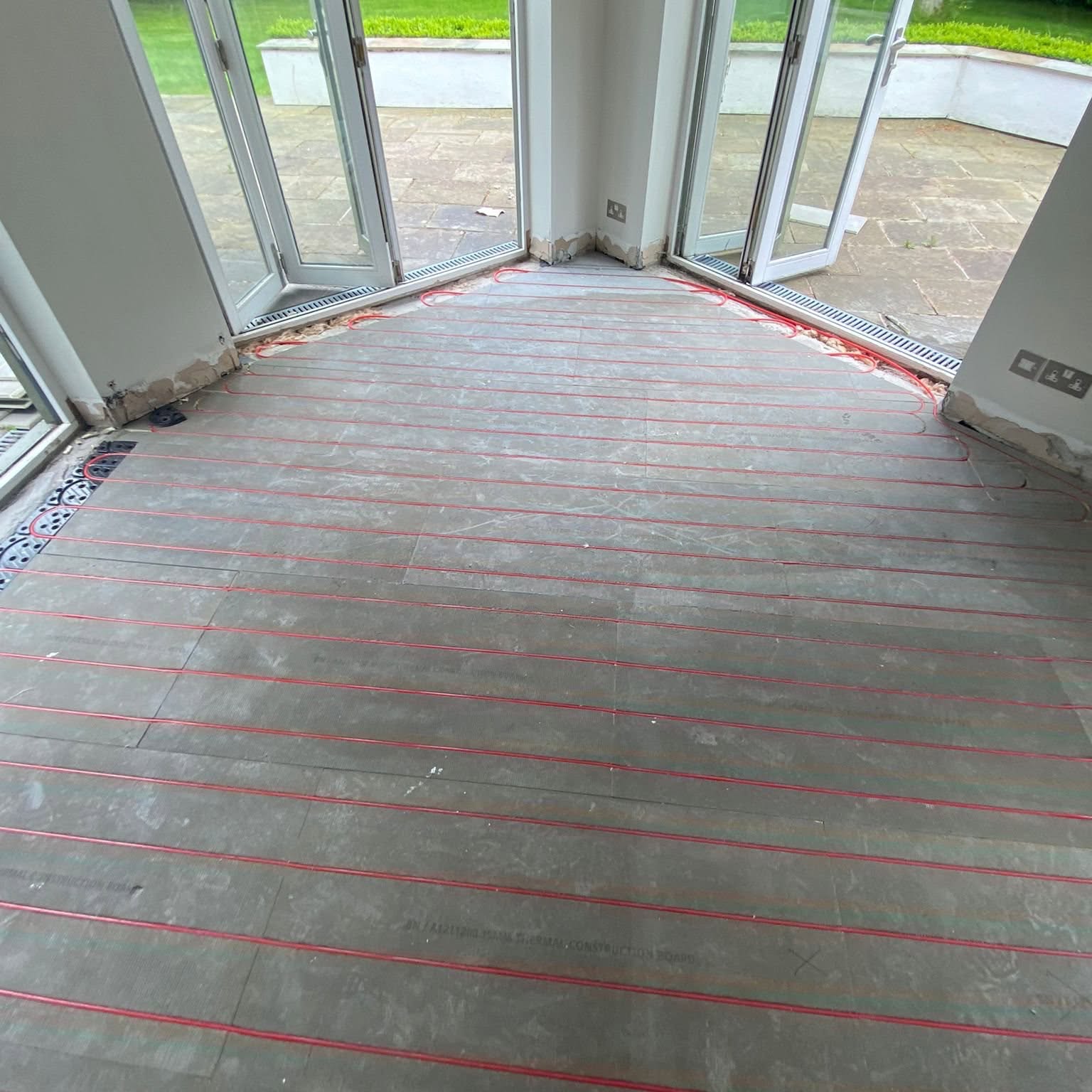 UFH pipework fixed to insulation boards ready for screed, Oldham